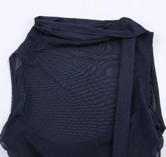 Navy blue fabric draped over a white background
