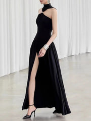 Black evening gown with a high slit