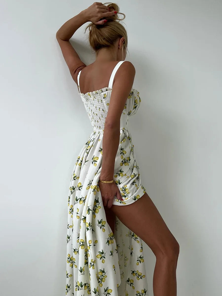 Woman wearing a floral dress against a white background
