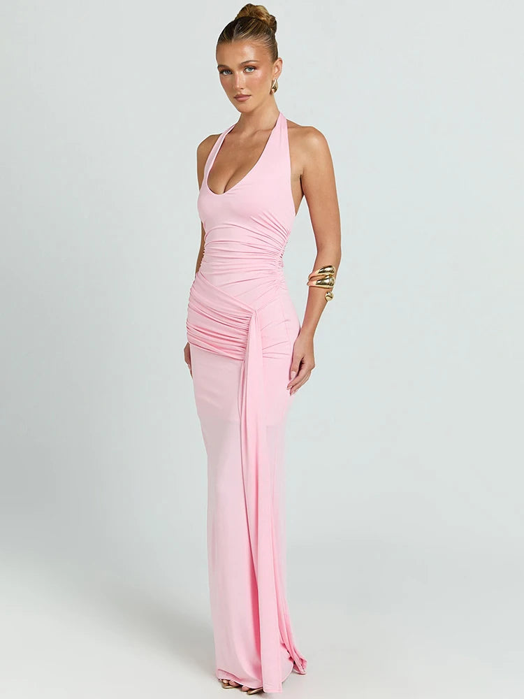 Woman wearing a pink evening gown on a white background