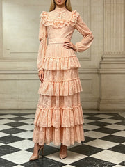 Model wearing a peach ruffle lace maxi dress