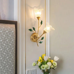 A delicate French country-style wall lamp with LED flowers, casting a warm glow on a bedroom wall. Golden Atelier 13