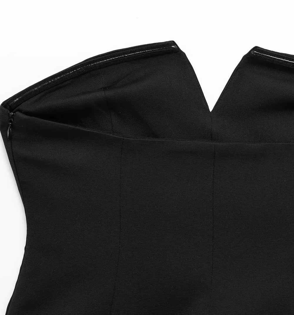 Black strapless dress on a white background