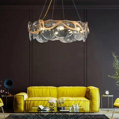  Modern smoke grey chandelier with glass accents, hanging in a stylish living room. Golden Atelier 2