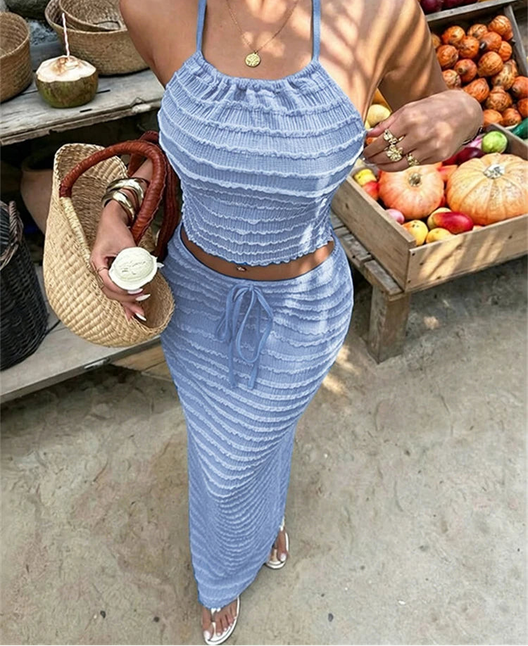 Textured knit halter crop top and column skirt set in blue.