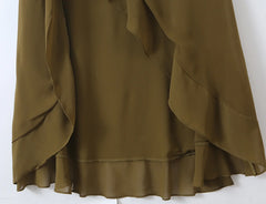 Detail of the ruffled hem on the halter midi dress