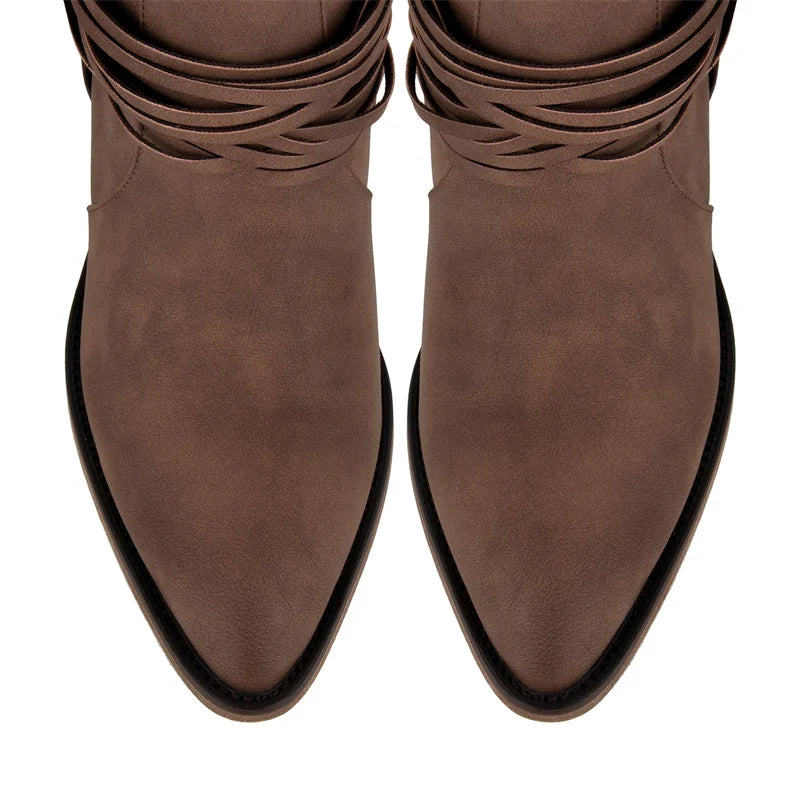 Top view of pointed toe faux suede boots