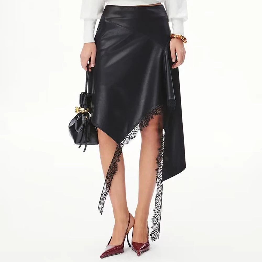 Close-up of lace trim on an asymmetrical faux leather midi skirt