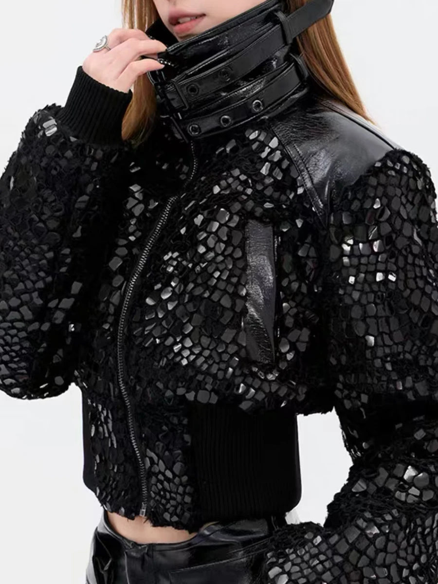 Black sequin jacket worn by a person 