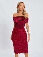Red off-shoulder dress worn by a model on a white background