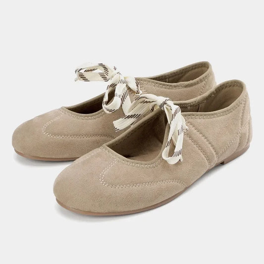 Khaki faux suede round toe ballet flats with ribbon lace-up detail.