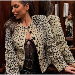 Model wearing a spotted faux fur jacket.