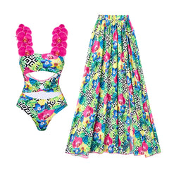 Geometric and floral print one-piece swimsuit and maxi skirt laid flat