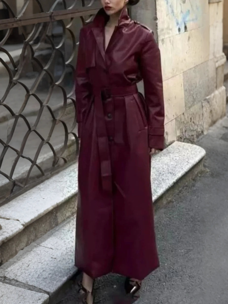 Burgundy faux leather trench coat with belted waist