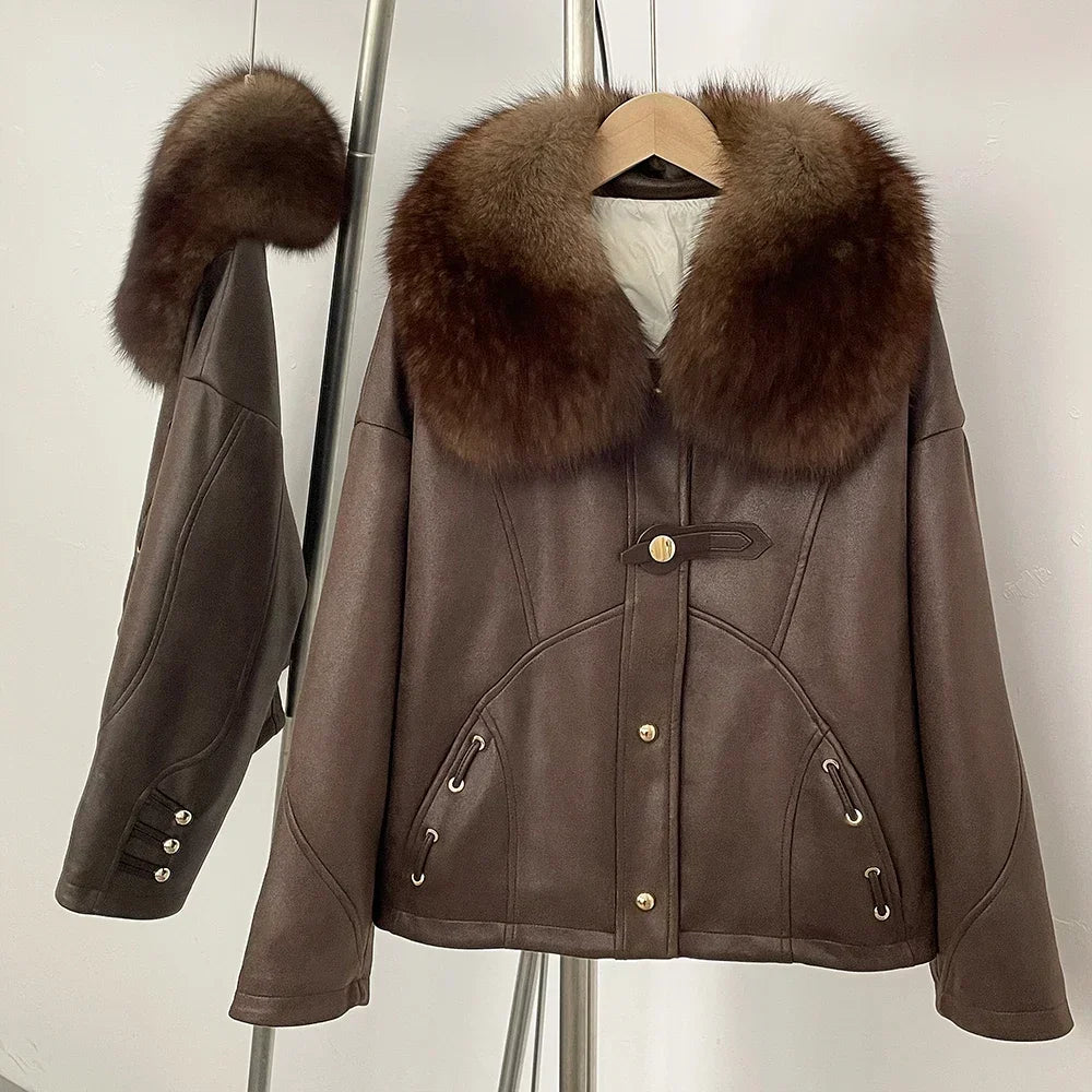 Brown leather jacket with fur collar on a hanger against a white background