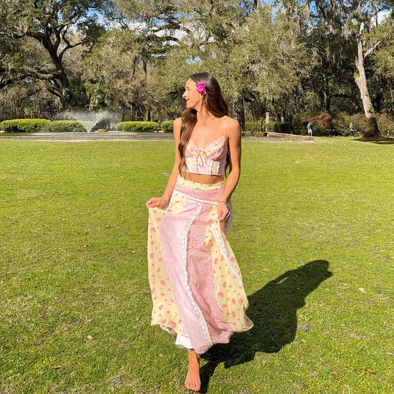 Patchwork lace trimmed crop top and flowing maxi skirt set in a park