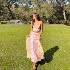 Patchwork lace trimmed crop top and flowing maxi skirt set in a park