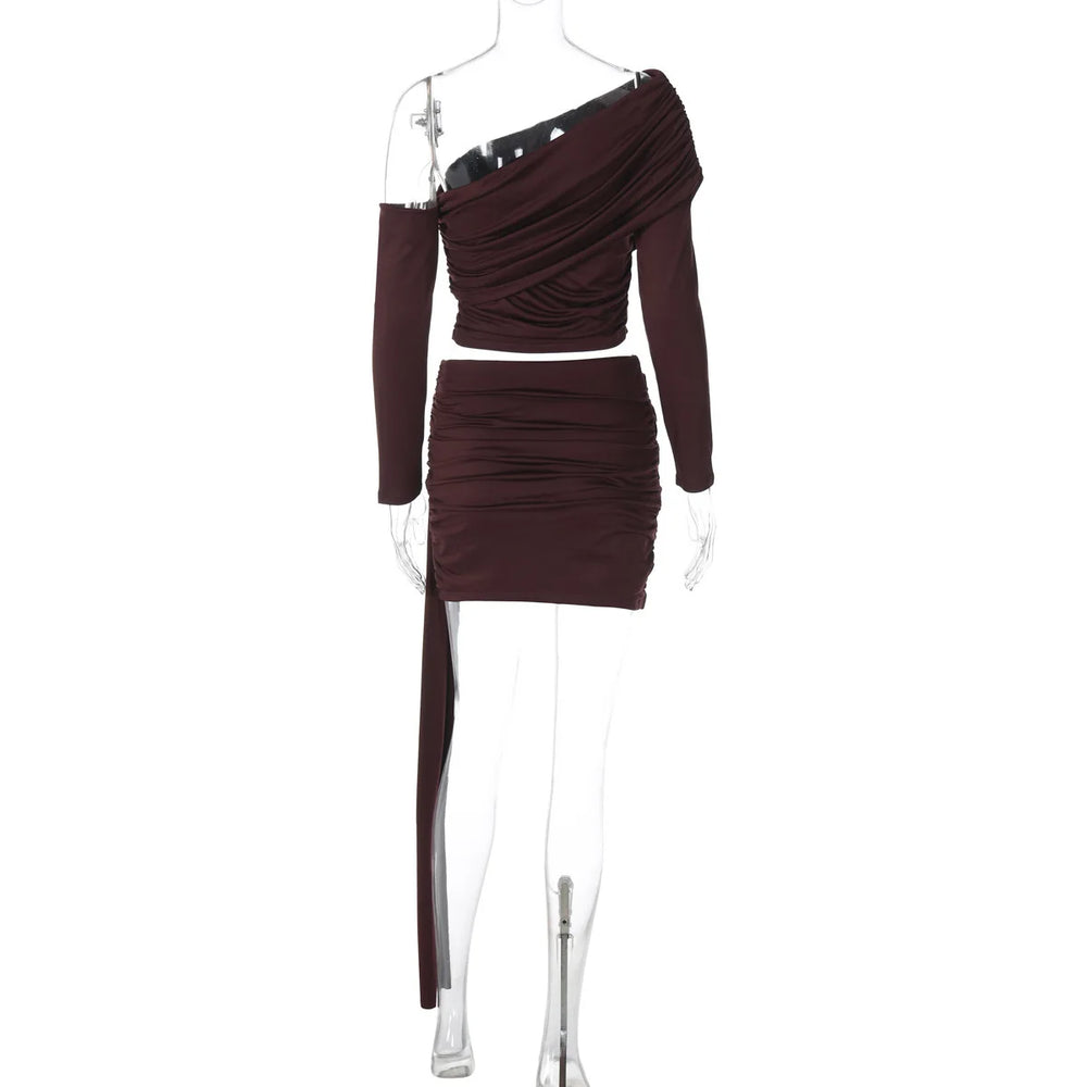 Brown ruched dress on a mannequin against a white background