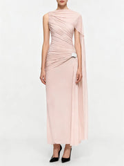 Woman wearing a pink one-shoulder dress on a white background