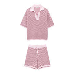 Pink and white striped knit top and shorts set laid flat
