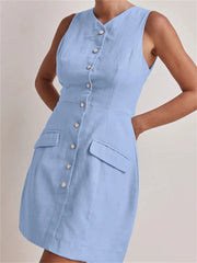 Light blue dress with button details on a neutral background