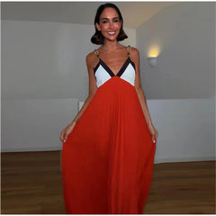 Colorblock chain strap maxi dress with pleated skirt