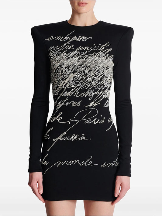 Beaded script long sleeve mini dress on mannequin