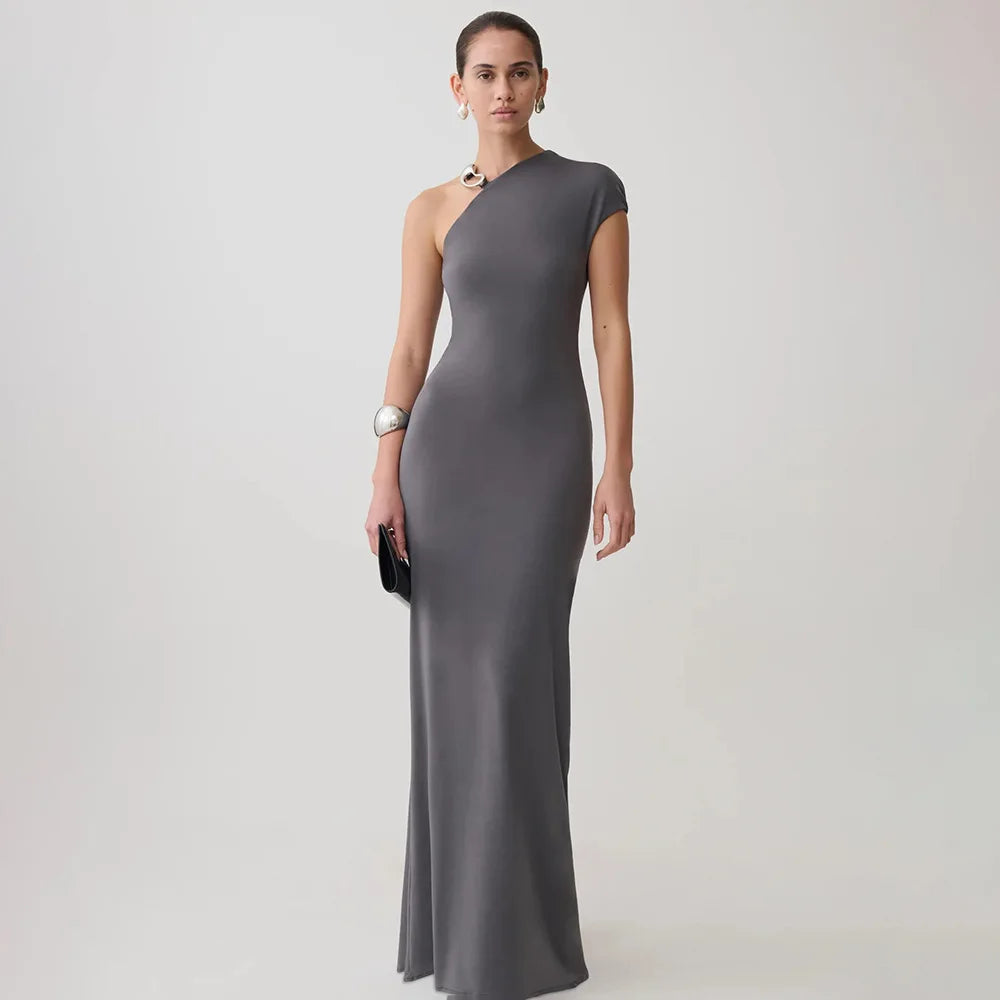 Gray one shoulder maxi dress with jewelry