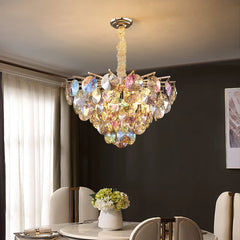 A colorful crystal pendant light hanging in a modern living room, adding a vibrant touch.  Golden Atelier 2