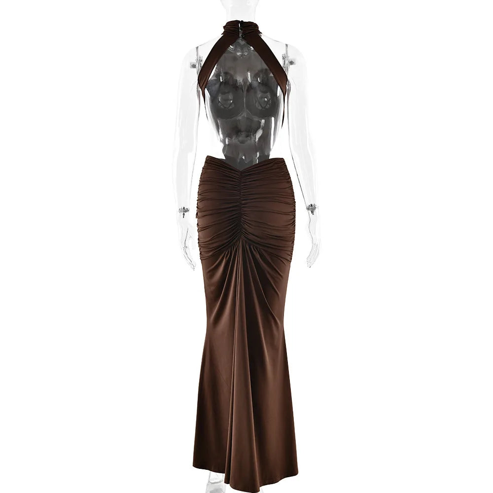 Brown evening gown on a mannequin against a white background