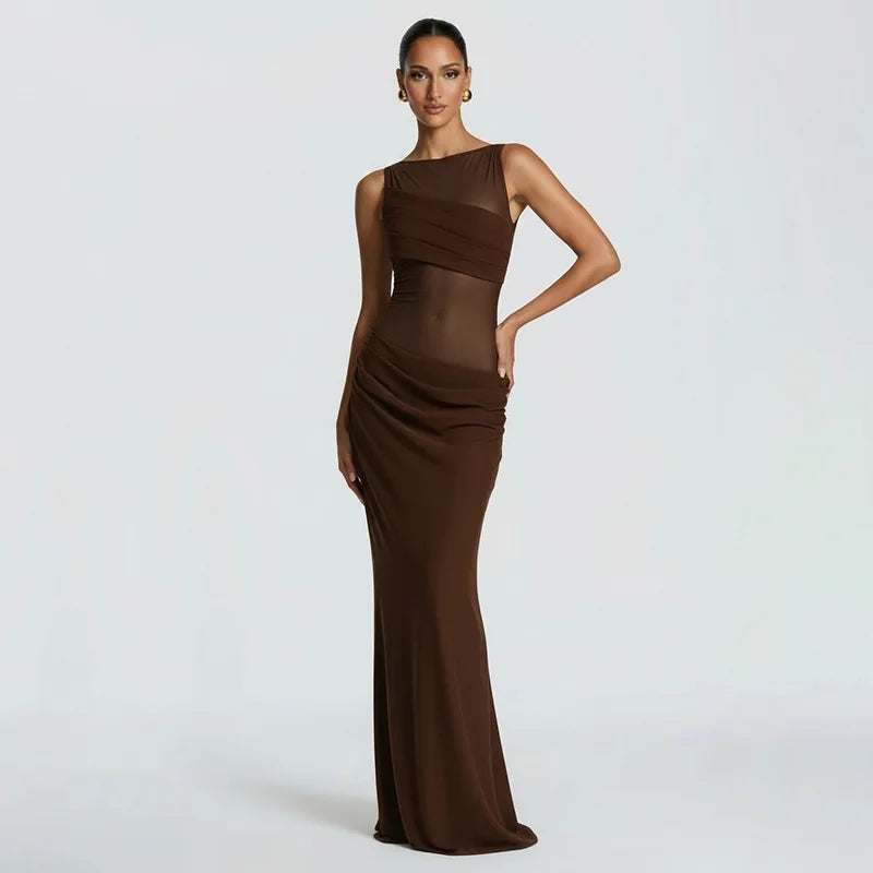 Woman wearing a brown evening gown on a white background