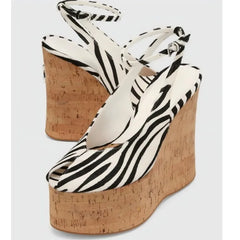 Close-up of zebra print wedge platform heels