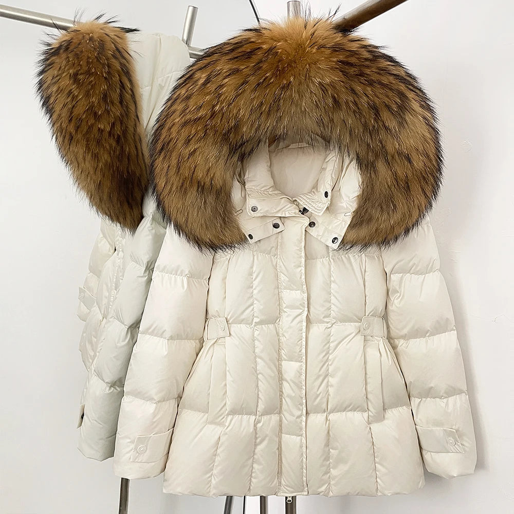 White puffer jacket with a large fur hood 