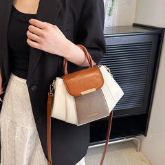 A woman carrying the patchwork shoulder bag, demonstrating its versatility and spacious interior.