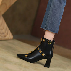 Black studded pointed toe block heel ankle boots detail