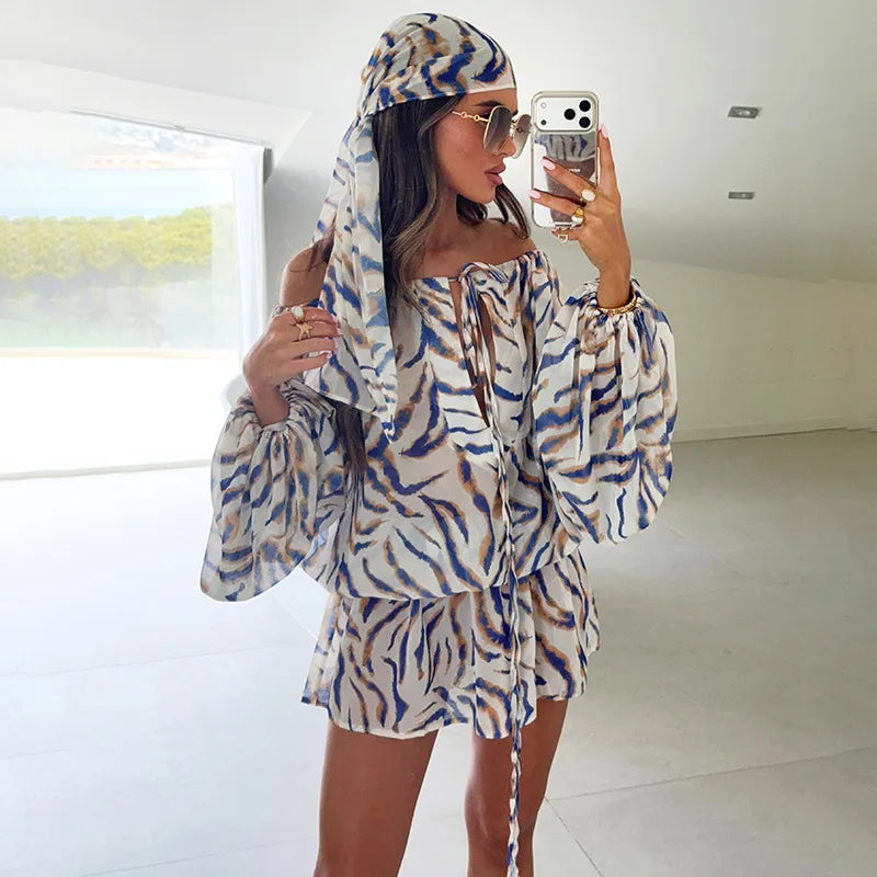 Striped off shoulder mini dress detail