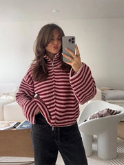 Striped knit sweater with stand collar and zip closure