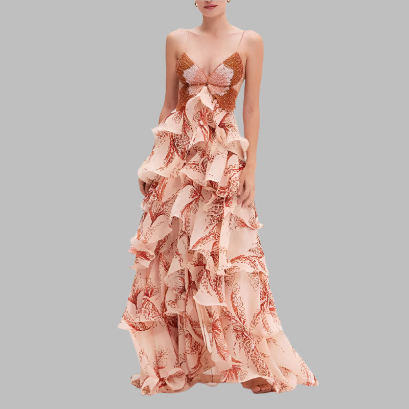 Long floral dress with ruffled layers on a white background