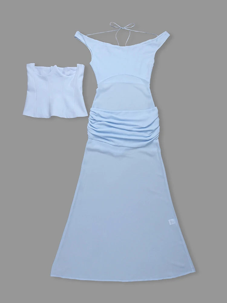 Light blue dress with matching top on a gray background