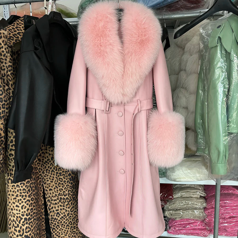 Pink coat with fur trim in a clothing store setting