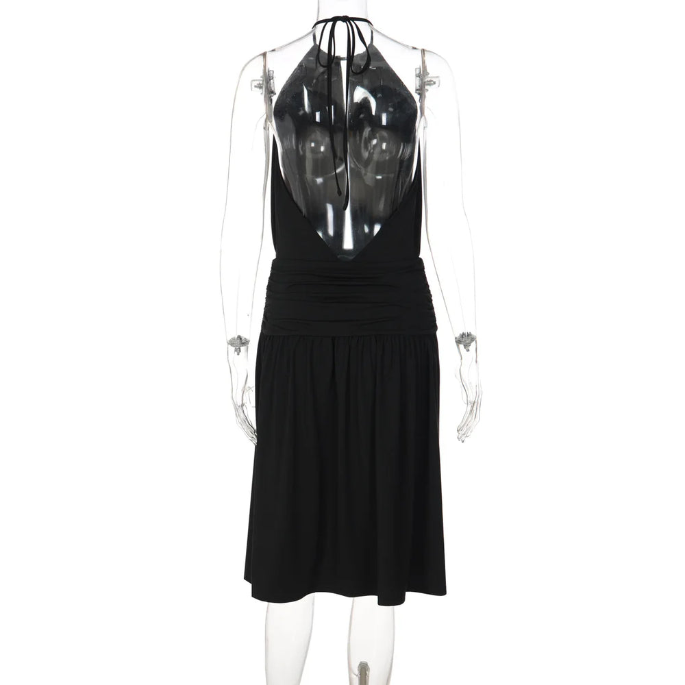 Black dress on a transparent mannequin against a white background