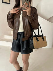 Brown faux leather moto jacket with woven handbag