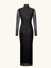 Black dress with sheer sleeves on a white background