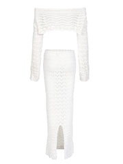 White lace top and skirt set on a white background
