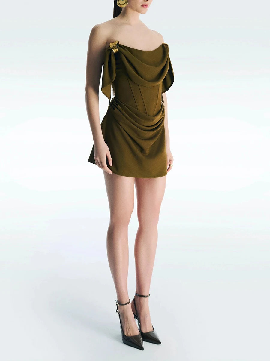 Full body shot of olive green draped mini dress with heels