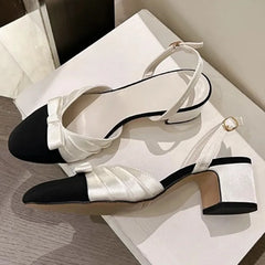 White bow slingback mid heel pumps side view