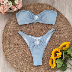 Sparkling bandeau bikini swimwear set laid flat