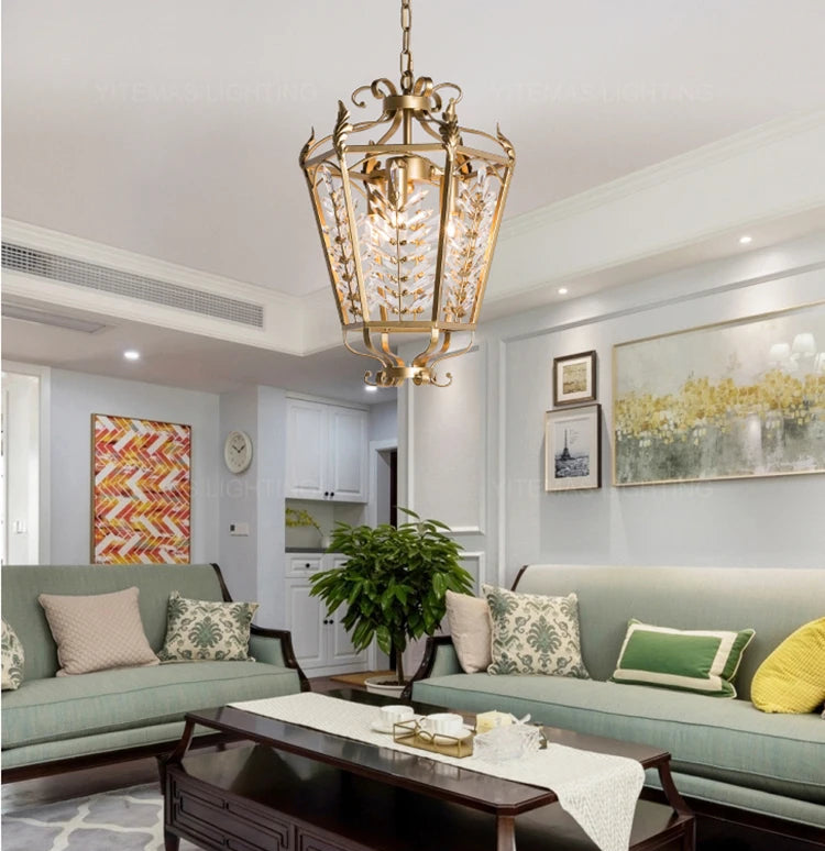 Modern living room with a chandelier, couches, and coffee table.