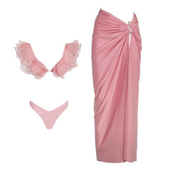 Pink ruffled V-neck bikini top and draped wrap skirt set.