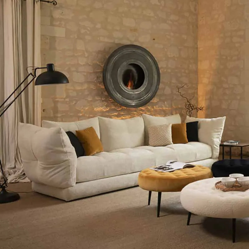 Minimalist white sofa in stone wall living room with arc design and warm lighting